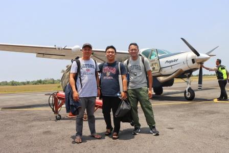 Dendi, Engga, and Gede at the Fatmawati Soekarno airport, Bengkulu, before departing for Enggano island